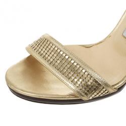 مملوكة مسبقًا صندل بحزام للكاحل جيمي تشو ذهبي مقاس 39