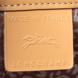 Pre Owned Longchamp Beige Perforated Leather Le Pliage Heritage Top Handle Bag