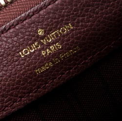 مملوكة مسبقًا Louis Vuitton Aurore Monogram Empreinte Leather Petillante Clutch