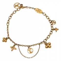 Louis Vuitton Blooming Supple Gold Tone Charm Bracelet at 1stDibs   blooming bracelet, louis vuitton flower full bracelet, lv blooming bracelet