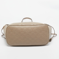 Pre Owned Louis Vuitton Tourterelle Monogram Empreinte Leather Neverfull MM Bag