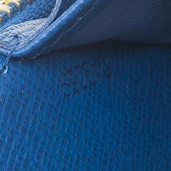 Pre Owned محفظة لوي فيتون فلايت باغز بانام زيبي إصدار محدود جلد أزرق طويلة.