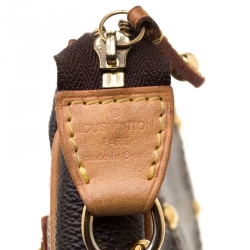 Pre Owned Louis Vuitton Monogram Canvas Limited Edition Riveting Pochette Accessoires Bag