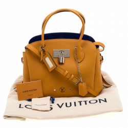 Pre Owned حقيبة لوي فيتون ميلا جلد زعفران PM
