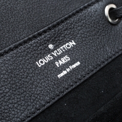 مملوكة مسبقًا حقيبة ظهر لوي فيتون Lock Me جلد سوداء