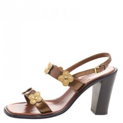 مملوكة مسبقًا Louis Vuitton Brown Leather Floral Cut Out Embellished Ankle Strap Sandals Size 36.5