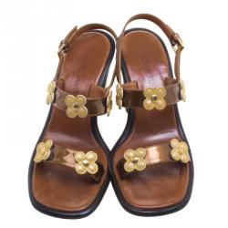 مملوكة مسبقًا Louis Vuitton Brown Leather Floral Cut Out Embellished Ankle Strap Sandals Size 36.5