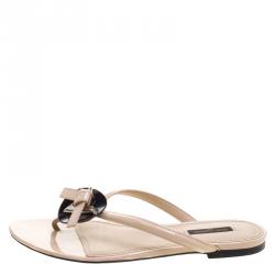 مملوكة مسبقًا Louis Vuitton Beige Patent Leather Bow Flat Sandals Size 38