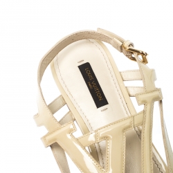 مملوكة مسبقًا Louis Vuitton Cream Patent Leather Crossing Logo Flat Sandals Size 40