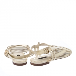 مملوكة مسبقًا Louis Vuitton Cream Patent Leather Crossing Logo Flat Sandals Size 40