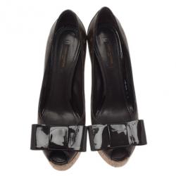 مملوكة مسبقًا Louis Vuitton Monogram Brown Canvas Rivoli Cork Platform Peep Toe Pumps Size 37.5