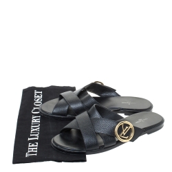 Pre Owned Louis Vuitton Black Leather Cross Strap LV Circle Embellished Flat Slides Size 38