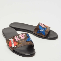 Pre Owned Louis Vuitton Brown Canvas Love Logo Slide Flats Size 39.5