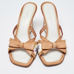 Pre Owned Louis Vuitton White/Tan Monogram Canvas and Leather Bow Wedge Slide Sandals Size 38.5