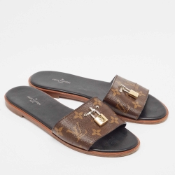 Pre Owned Louis Vuitton Brown Monogram Coated Canvas Lock It Flat Slides Size 38