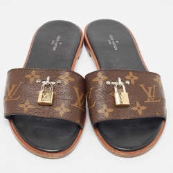 Pre Owned Louis Vuitton Brown Monogram Coated Canvas Lock It Flat Slides Size 38