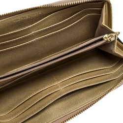 مملوكة مسبقًا محفظة مايكل كورس جلد مونوغرومي ذهبي لامع جيت سيت بسحاب محيط