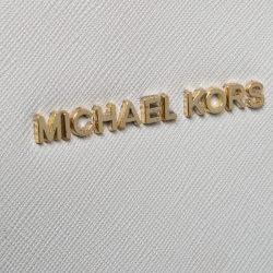 Pre Owned حقيبة يد مايكل كورس ترافل جت ست جلد كريمية