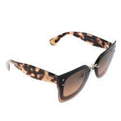 Pre Owned نظارة شمسية ميو ميو  SMU 04R  بني ترتواز فراشة