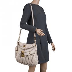 مملوكة مسبقًا Miu Miu Beige Matelasse Lux Leather Coffer Hobo