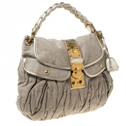 مملوكة مسبقًا حقيبة ميو ميو كوفر جلد فاخر مبطنة بيج /ذهبية