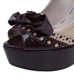 مملوكة مسبقًا حذاء كعب عالي ميوميو ماري جين فيونكة لامعة بلونين وكعب أمامي مقاس 38.5