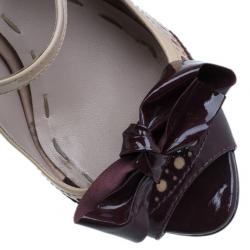 مملوكة مسبقًا حذاء كعب عالي ميوميو ماري جين فيونكة لامعة بلونين وكعب أمامي مقاس 38.5