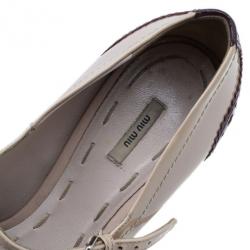 مملوكة مسبقًا حذاء كعب عالي ميوميو ماري جين فيونكة لامعة بلونين وكعب أمامي مقاس 38.5