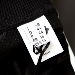 Pre Owned Moschino Couture Black Logo Embossed Jacquard Jogger Pants L