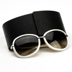مملوكة مسبقًا Prada Cream Round Woman Sunglasses