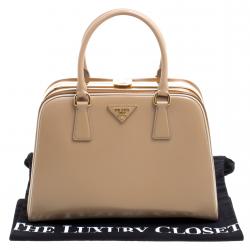 Pre Owned Prada Beige/Caramel Patent Leather Pyramid Frame Top Handle Bag