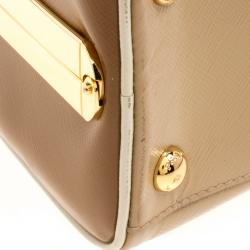 Pre Owned Prada Beige/Caramel Patent Leather Pyramid Frame Top Handle Bag