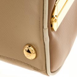 Pre Owned Prada Beige/Caramel Patent Leather Pyramid Frame Top Handle Bag