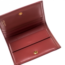 Pre Owned Prada Peach Saffiano Metal Leather Bifold Wallet