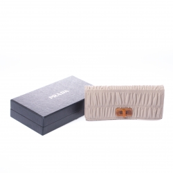 Pre Owned Prada Off White Gaufre Leather Turn Lock Continental Wallet