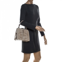 Pre Owned Prada Beige Logo Print Patent Leather Frame Top Handle Bag