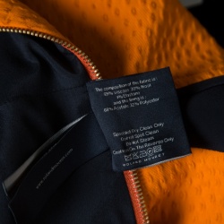 Pre Owned Roland Mouret Orange and Black Paneled Ajanta Peplum Top S