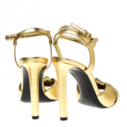 Pre Owned صندل سان لوران باريس ايمي سير كاحل جلد ذهبي مقاس 38