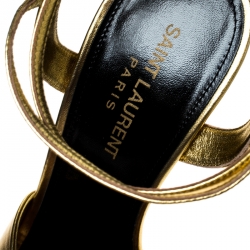 Pre Owned صندل سان لوران باريس ايمي سير كاحل جلد ذهبي مقاس 38