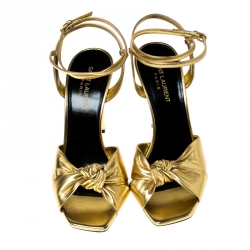 Pre Owned صندل سان لوران باريس ايمي سير كاحل جلد ذهبي مقاس 38