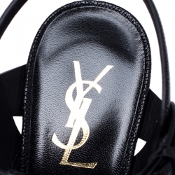 Pre Owned صندل سان لوران باريس سير كاحل تريبوت جلد حُبيبي أسود نعل سميك مقاس 38.5