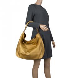 Saint Laurent Gold Leather Roady Hobo