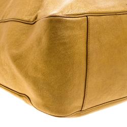 Saint Laurent Gold Leather Roady Hobo