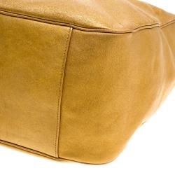 Saint Laurent Gold Leather Roady Hobo