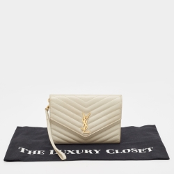 Pre Owned Saint Laurent Off White Matelasse Leather Cassandre Wristlet Clutch