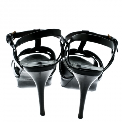 Pre Owned صندل سان لوران باريس تريبوت بنعل سميك جلد أسود مقاس 38.5