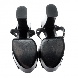 مملوكة مسبقًا صندل سان لوران باريس كاندي سير كاحل نعل سميك جلد أسود مقاس 40