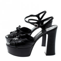 مملوكة مسبقًا صندل سان لوران باريس كاندي سير كاحل نعل سميك جلد أسود مقاس 40