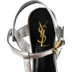 Pre Owned صندل سان لوران تريبوت جلد فضي ميتاليك نعل سميك مقاس 37