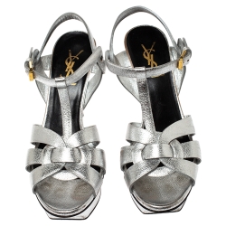 Pre Owned صندل سان لوران تريبوت جلد فضي ميتاليك نعل سميك مقاس 37